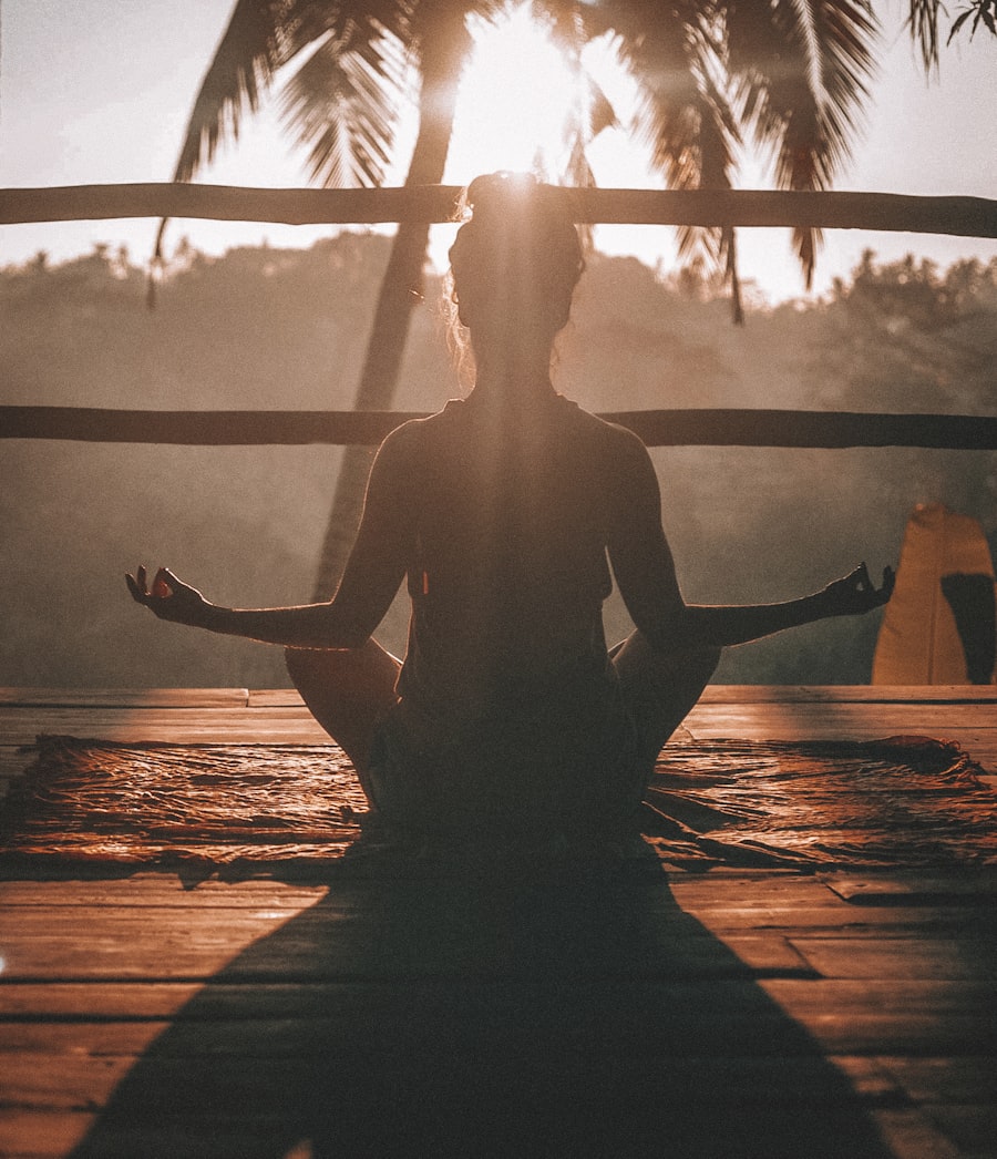 Person stretching outdoors during a calm body awareness session for Drainingbeauty